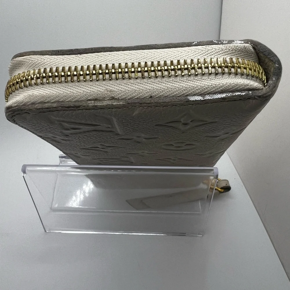 GUC Louis Vuitton Monogram Cream Empreinte Zippy Wallet - Picture 3 of 11